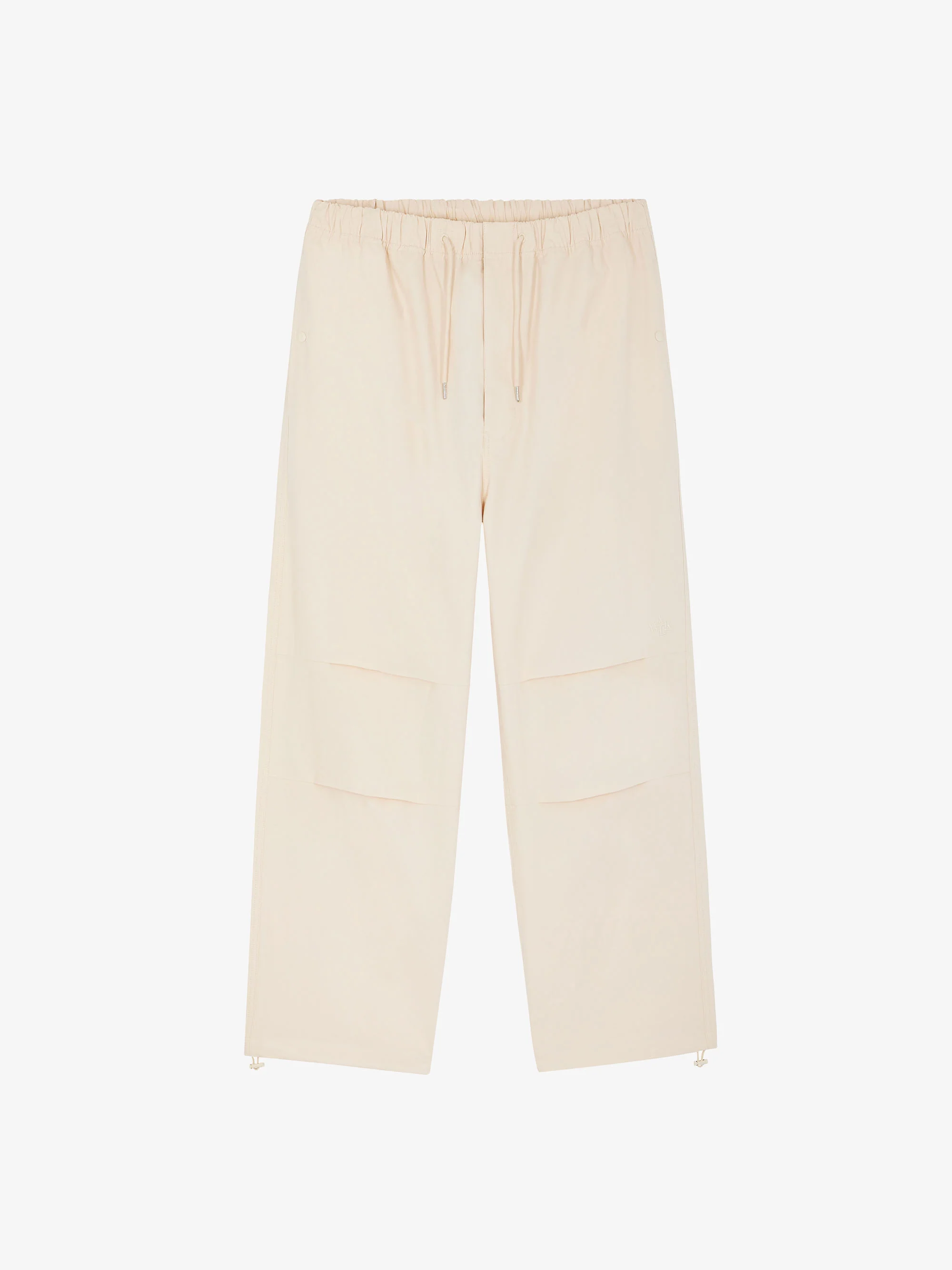 Le pantalon parachute sable