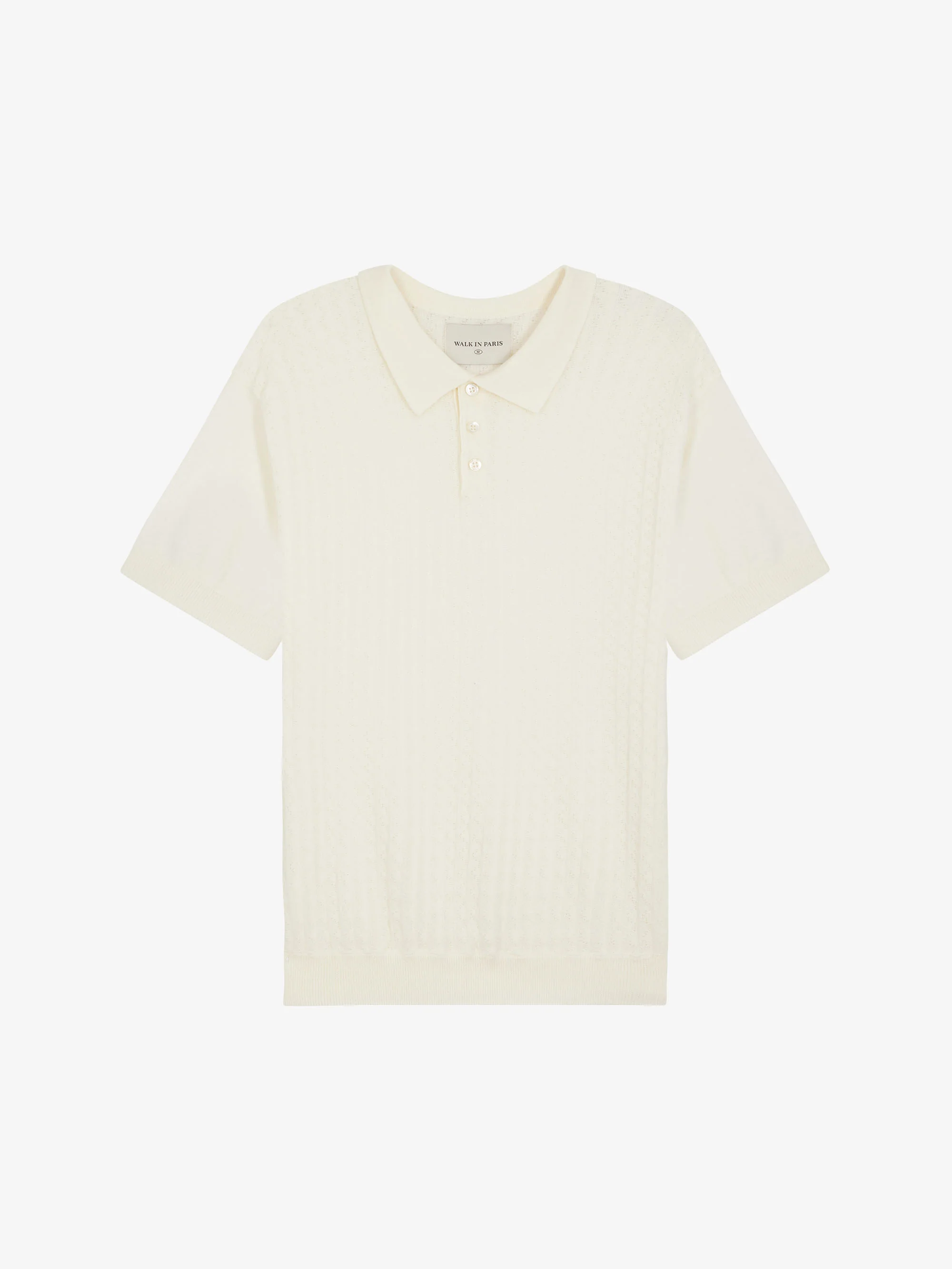 Le polo beige en maille torsadée