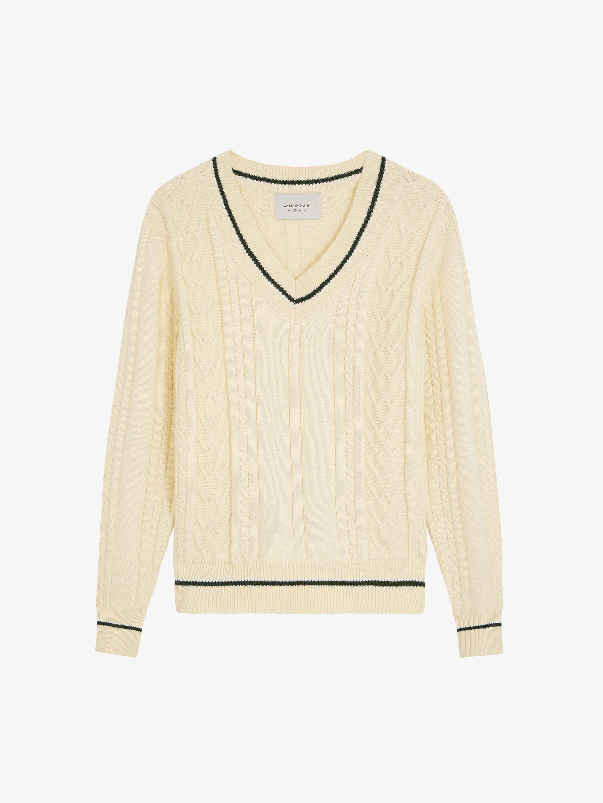 Le pull en maille beige