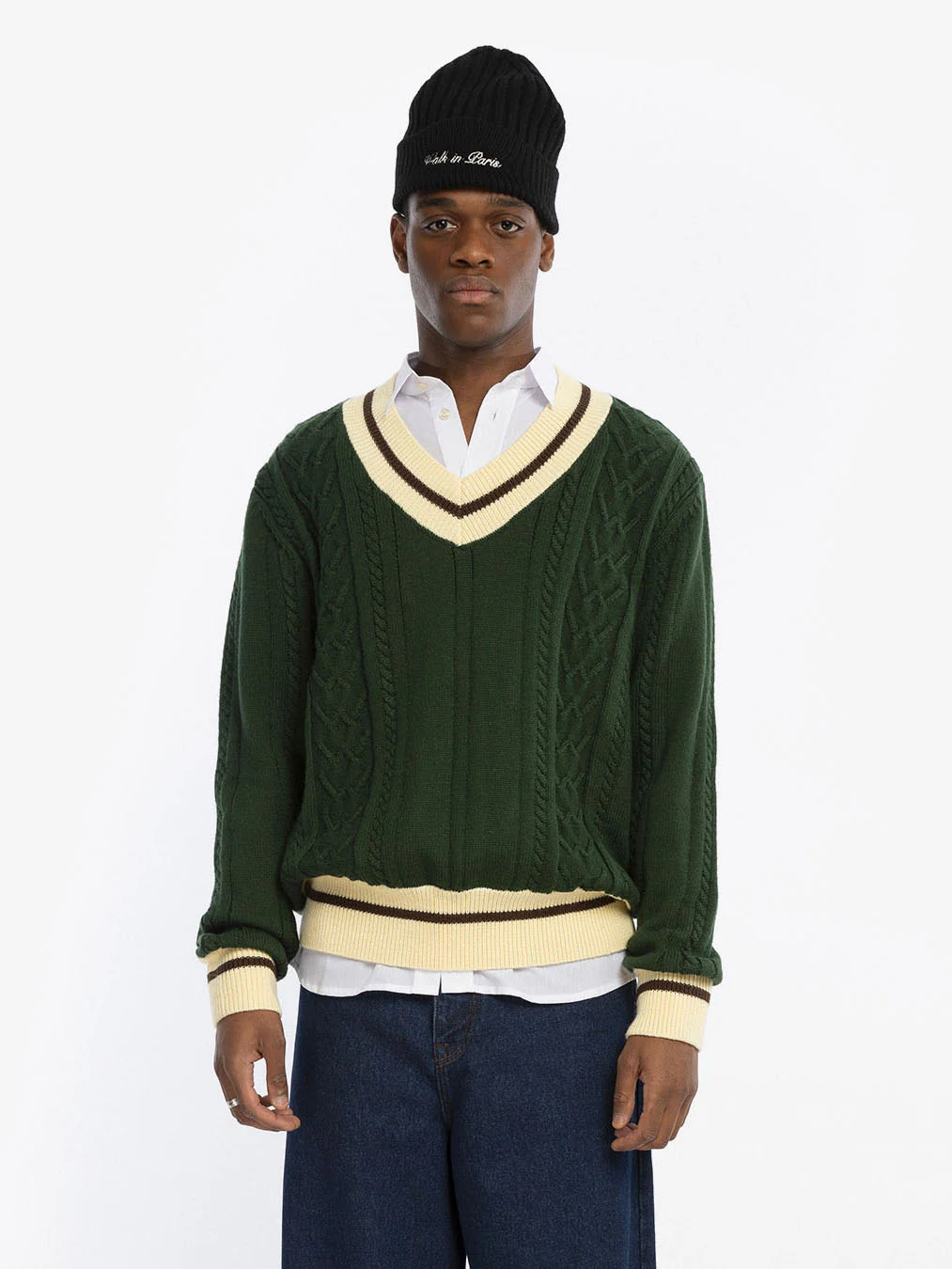 Le pull en maille vert